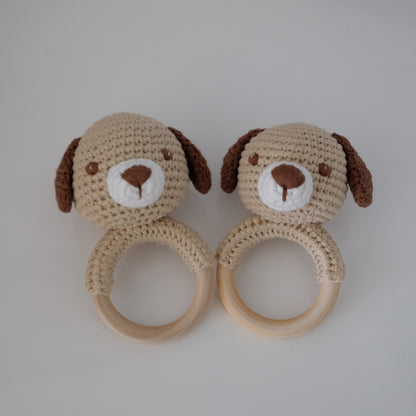 Handmade crochet rattle with a wooden ring base